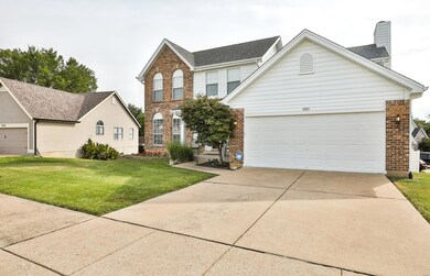 Concrete driveway leads to the 20x19 two car Garag