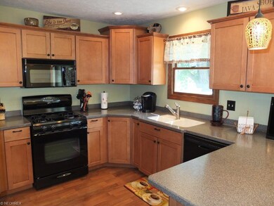 Corian countertops and updated cabinets.