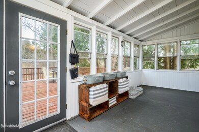enclosed porch to deck off kitchen