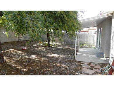 Property Photo. Backyard & Covered Patio
