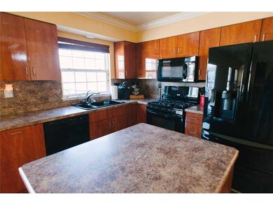 Kitchen. Lots of natural light flows into this wel