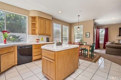 Kitchen is open to the breakfast area and family r