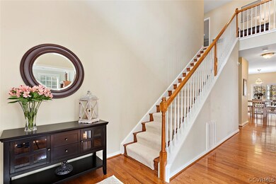 Light and bright, 2-story foyer greets you as you