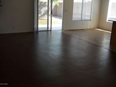 wood floor in family room & large tile