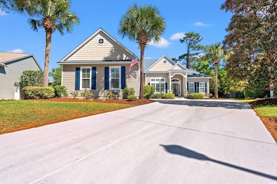 View of front facade featuring a front yard and dr