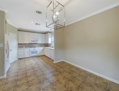 Clean kitchen with gas range