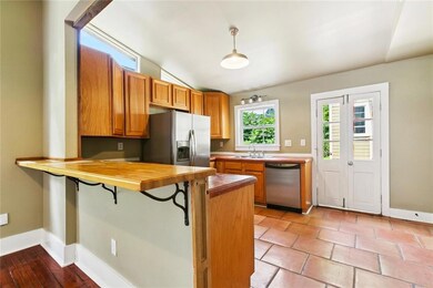 Kitchen with access to the exterior porch.