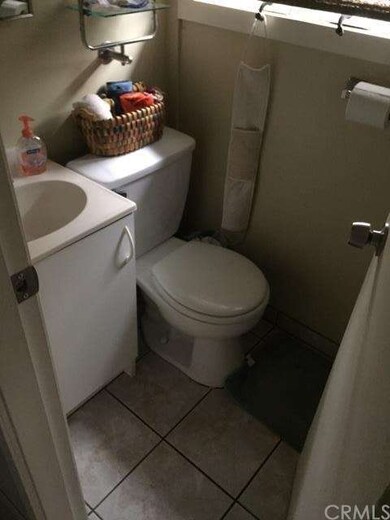 HALF BATHROOM NEXT TO SUNROOM