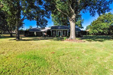 Relax on the swing on the large front porch overlo