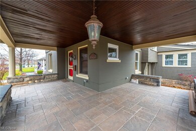 Magnificent architectrual delight, large stone wrap around porch which is more than a porch, it's a great place to while away the hours and enjoy the summer, spring and fall and decorate for winter.