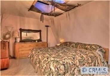 Third Floor Master Bedroom with Skylight