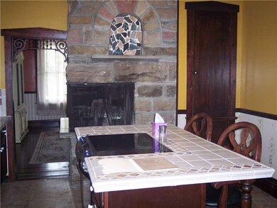 Kitchen. THE WOOD BURNING FIREPLACE IS SPECTACULAR