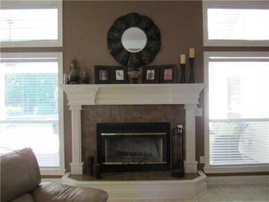 Living Room. Beautiful fireplace converted to wood