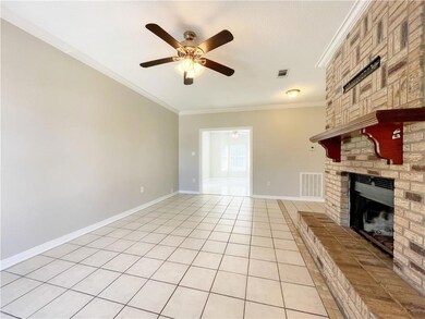 Living Room with wood burning Fireplace. Dining Ar