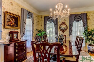 The formal dining room is located to the left of t