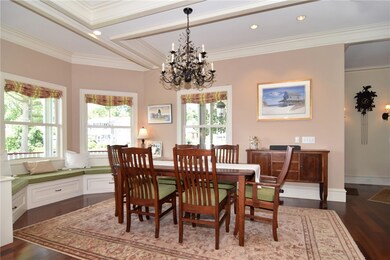 Built in dining storage nook with surround windows