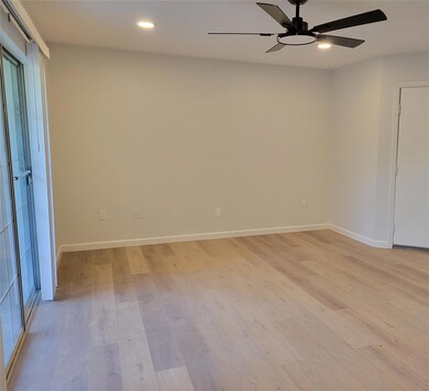 Unfurnished room featuring light wood-style floors