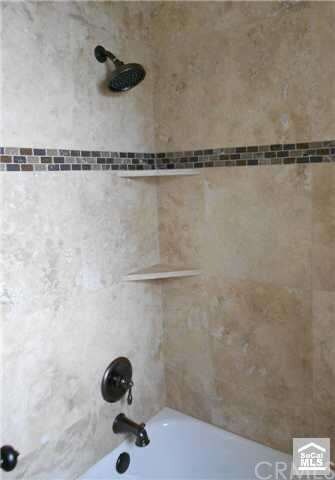 Secondary bath shower with custom tile job