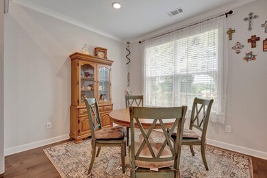 Dining space featuring wood-type flooring