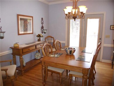 Casual dining room is open to the great room and kitchen.