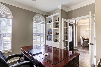 Off to the right of the entry you'll find a gorgeous home office / study area, which is so desirable for today's modern work needs from home.  Enjoy your beautiful French doors, sunny windows and, loads of beautiful built-ins and cabinets.
