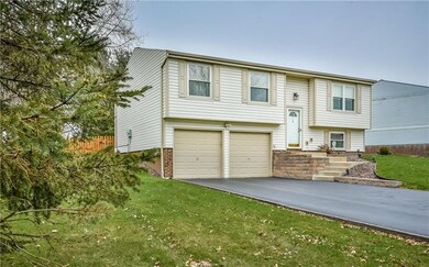 Front of house with new retaining wall and steps