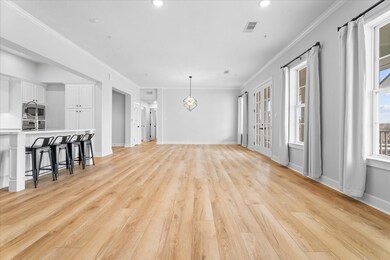 Open concept floor plan with kitchen, living room