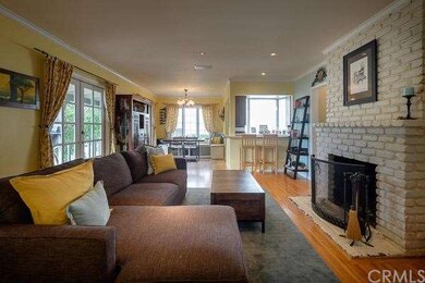 An open floorplan living room, eating area and ope