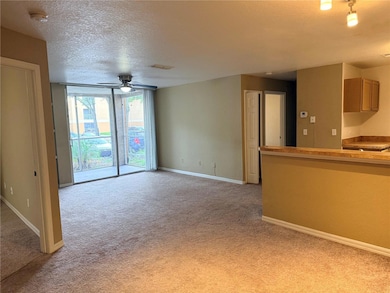 7606 Pissarro Dr unit 105, Orlando, FL 32819 - photo 3