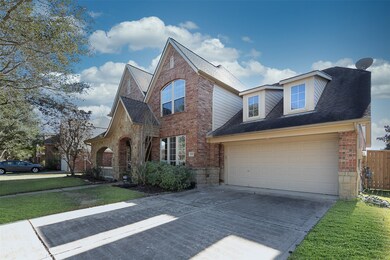 Traditional David Weekly home with tandem 3 car ga