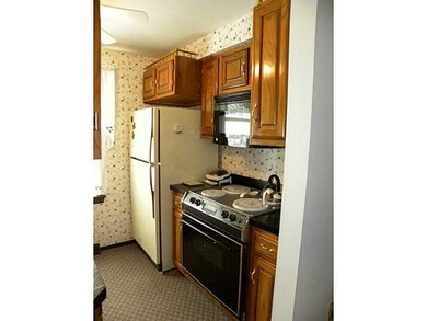 Kitchen. Over the stove microwave and even more ca