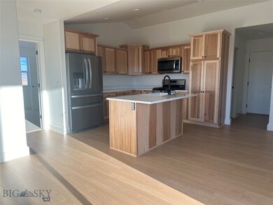 Kitchen featuring quartz countertops and Stainless