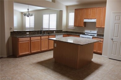 Kitchen view from dining area showing quality cabi