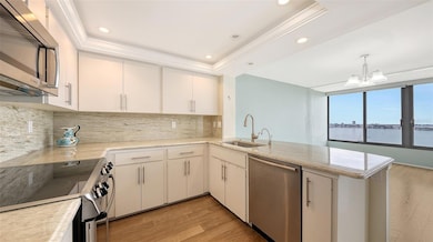 Light and bright condo with endless views from every room.