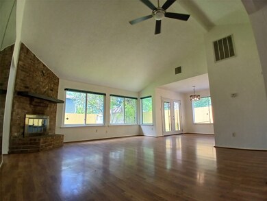Massive windows throughout the kitchen and living