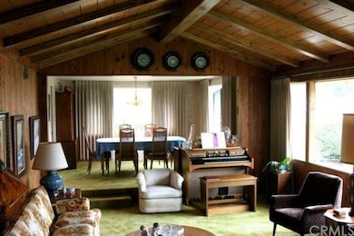 SUNKEN LIVING ROOM - VAULTED BEAM CEILINGS!