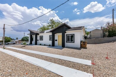 View of front facade featuring stucco siding