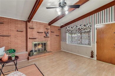 Hearth room with wood burning fireplace