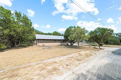 View of yard with a sunroom