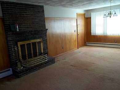 Den/Family/Great Room. Wood burning fireplace, ins