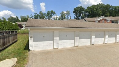 Second garage from the left, DIRECTLY across from