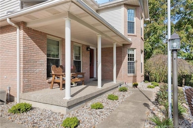 Covered front porch with seating area