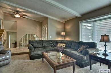 Another view of living room with custom bay window