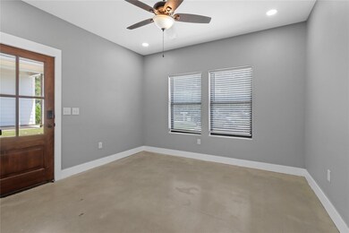 Empty room with baseboards, recessed lighting, con