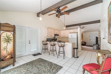 The kitchen/dining room are open.
