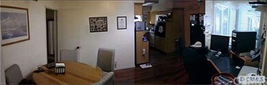 PANORAMIC VIEW: KITCHEN AND EATING AREA