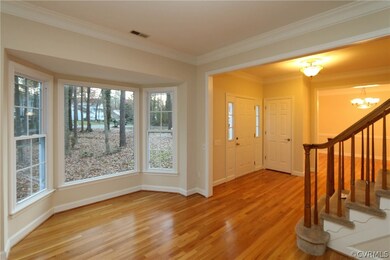 Bay window, foyer, dining room (R)