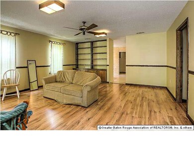 This spacious living area has plenty of window and