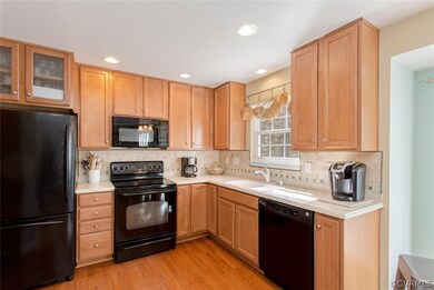 Kitchen w/custom ceramic backsplash