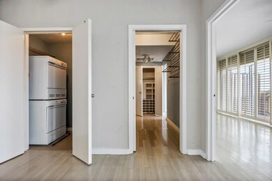 Asko stacked washer-dryer conveys. Pocket door to 